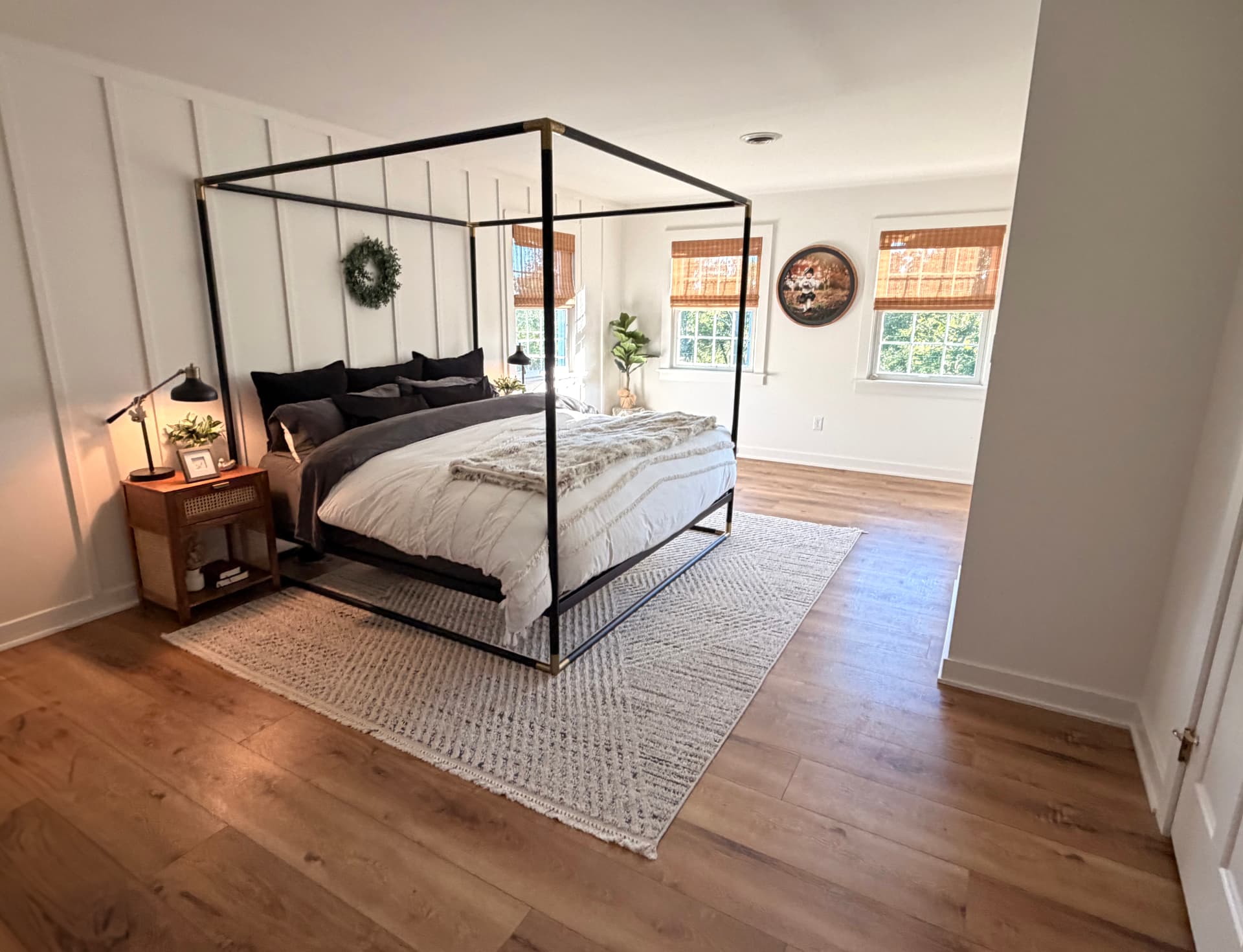 Bedroom with canopy bed and North Shore Oak flooring