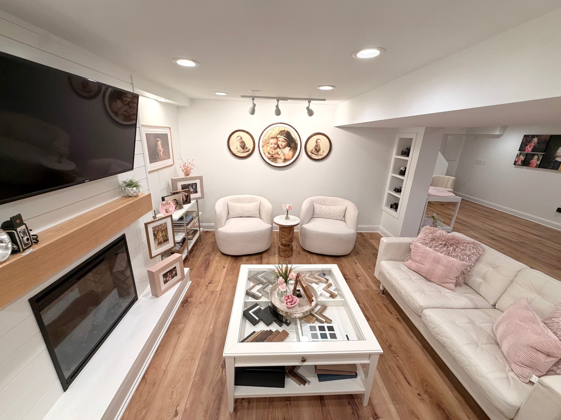 Living room seating area on warm oak flooring